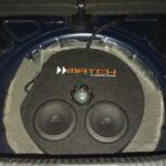 a speaker in the trunk of a car