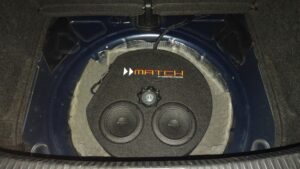 a speaker in the trunk of a car